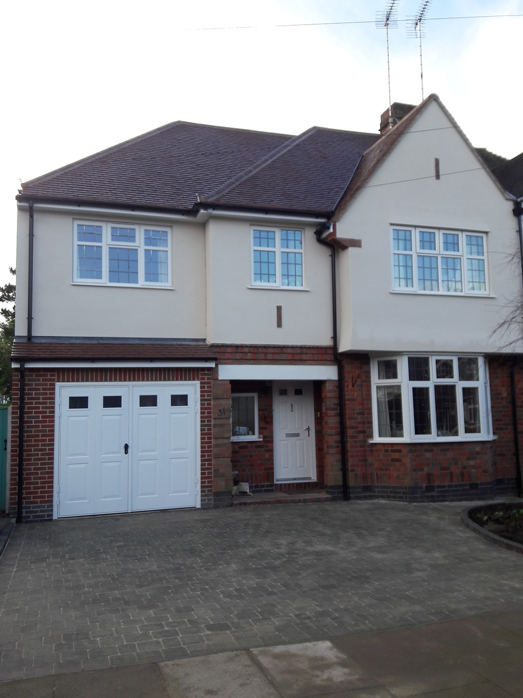 Two-storey house extension and roof