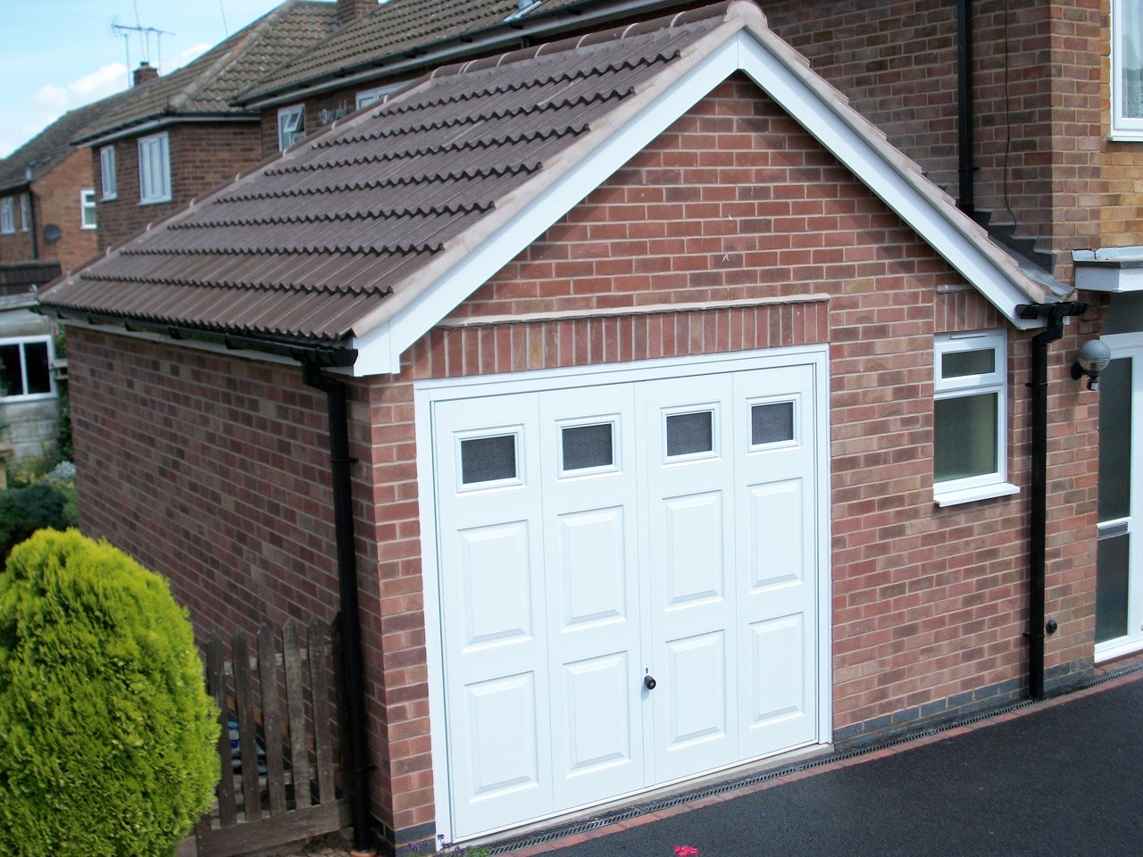 Brick garage and side extension